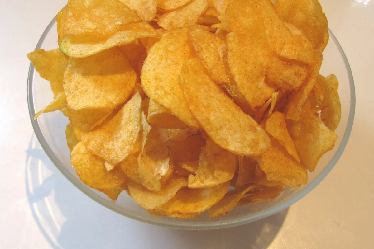 Category photograph illustrating Torres Black Truffle Potato Crisps; not the exact retail product